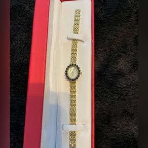 Gem Time Watch with Sapphire Blue colored crystal bezel for ladies.